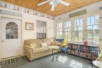 Three season front porch offers plenty of natural light